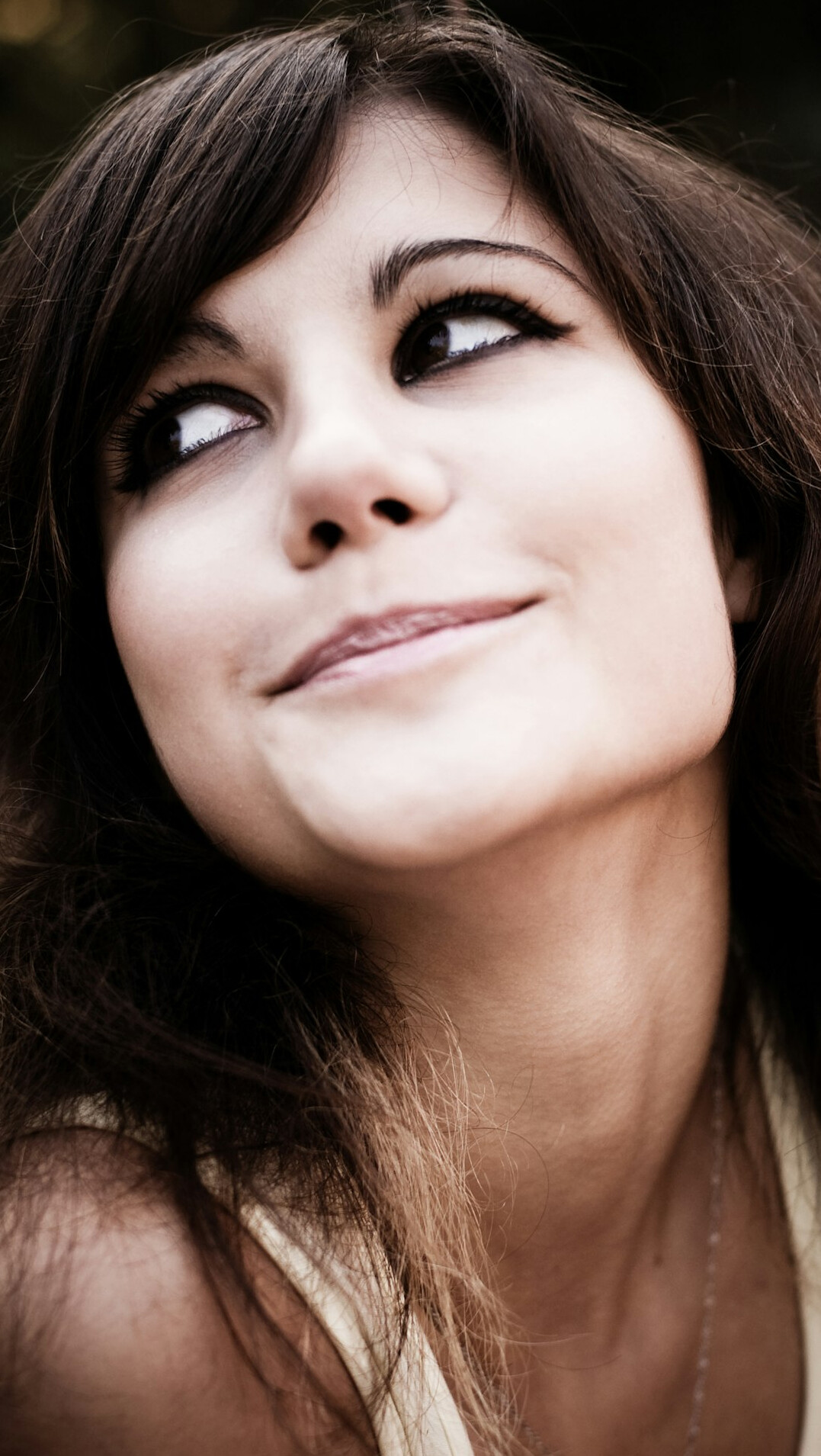 Smiling young woman portrait with dark hair